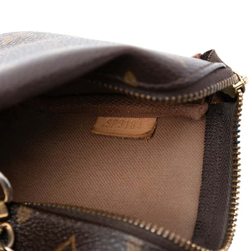 Louis Vuitton Monogram Mini Pochette Accessoires Brown Very good condition - Box View