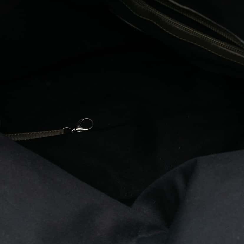 Chanel Quilted Coated Canvas Expandable Zip Travel Bag Brown Very good condition - Model View