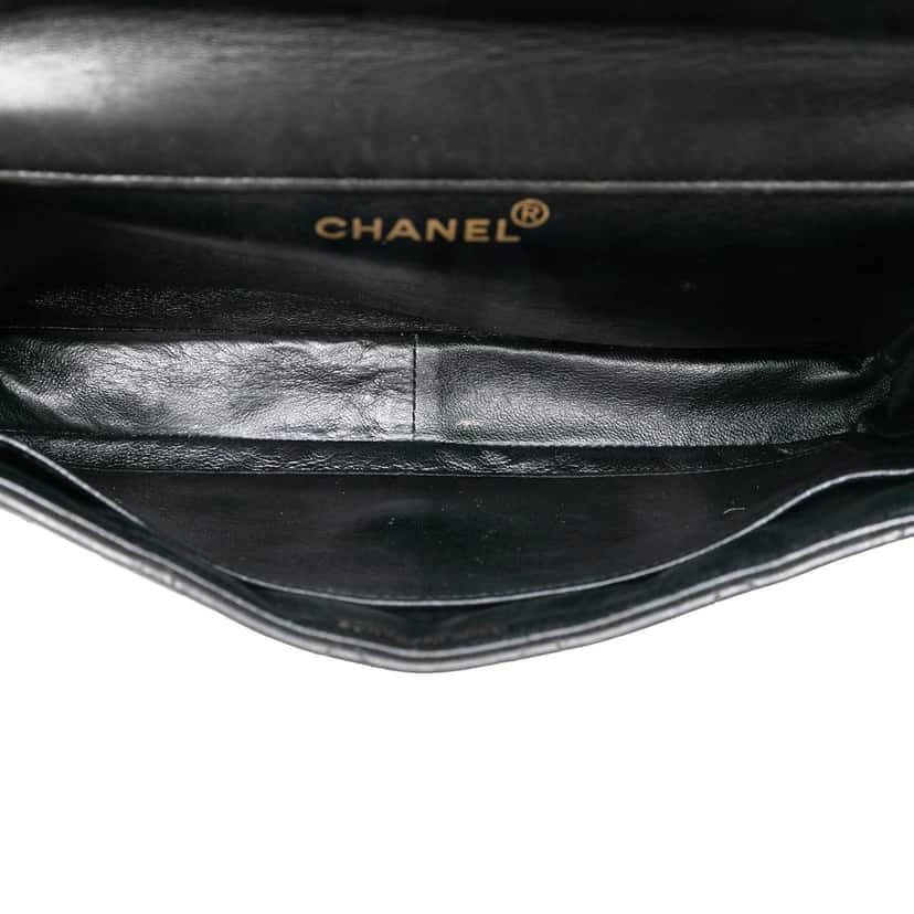 Chanel Medium Quilted Lambskin Double Sided Flap Black Leather Very good condition - Model View