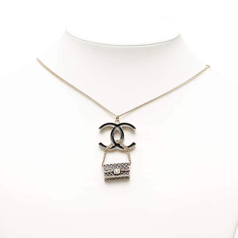 Chanel Gold Plated and Enamel CC and Flap Bag Pendant Necklace Gold Metal Very good condition - Box View