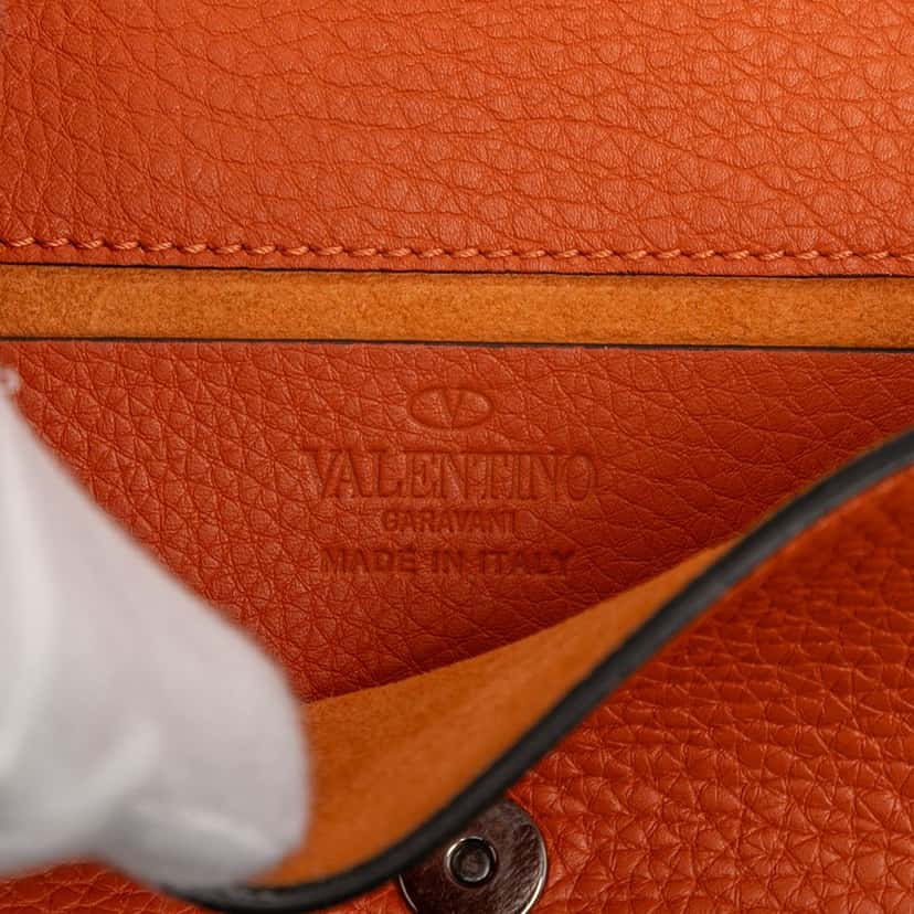 Valentino Pebbled Calfskin Rockstud Clutch on Chain Orange Leather Very good condition - Box View