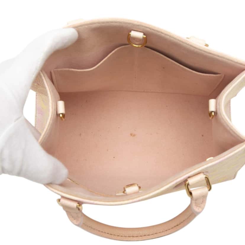 Louis Vuitton Monogram Empreinte Summer Stardust OnTheGo PM Pink Leather Very good condition - Model View