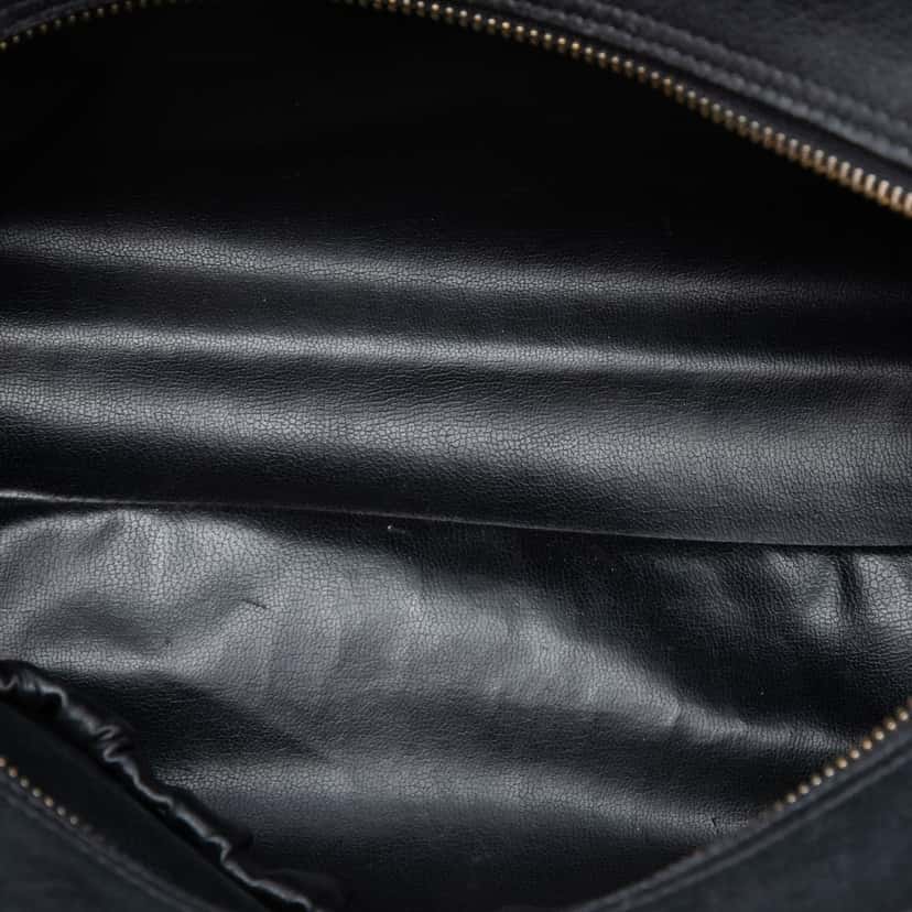 Chanel Quilted Lambskin Cosmetic Pouch Black Leather Very good condition - Model View