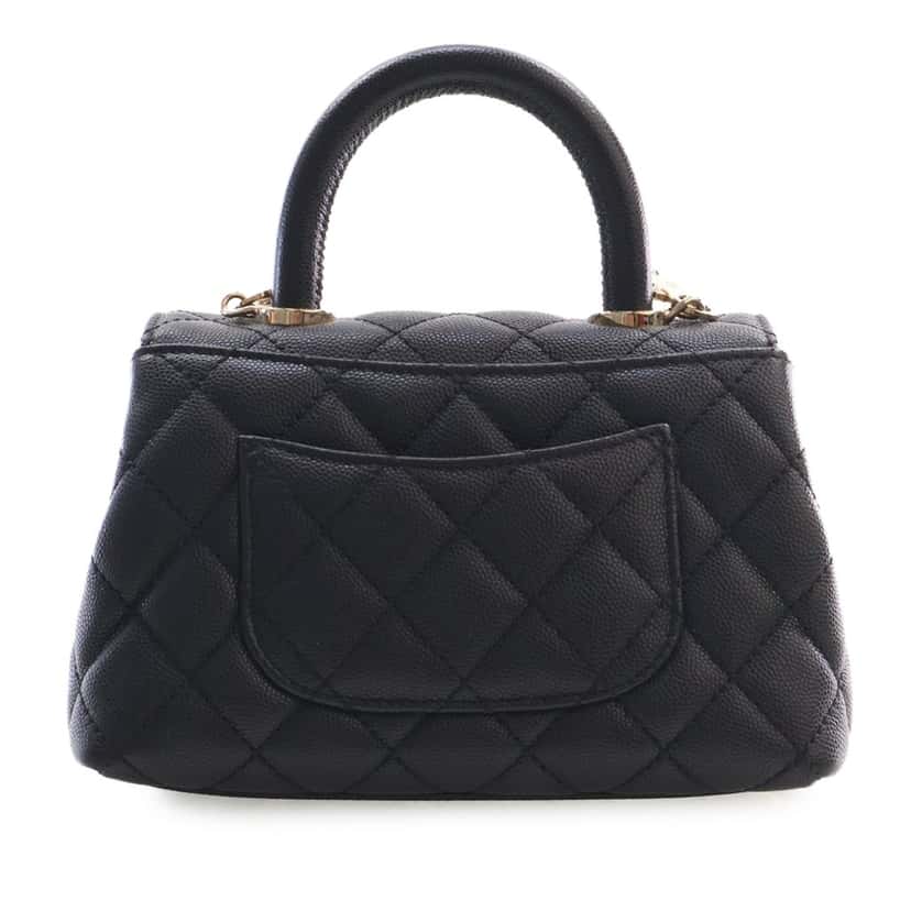 Chanel Extra Mini Quilted Caviar Coco Top Handle Bag Black Leather Very good condition - Model View