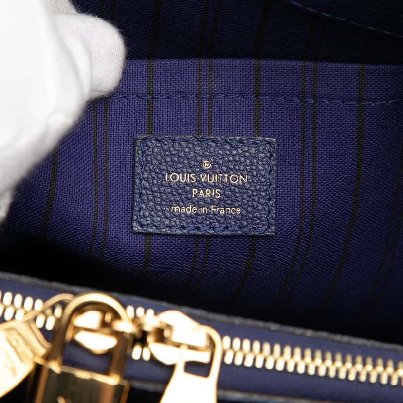 Louis Vuitton Monogram Empreinte Montaigne MM Blue Leather Very good condition - Box View