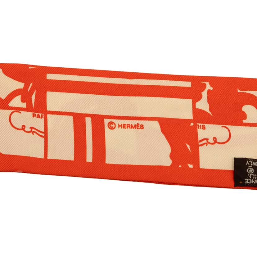 Hermès Brides De Gala Shadow Silk Twilly Scarf Orange Very good condition - Model View