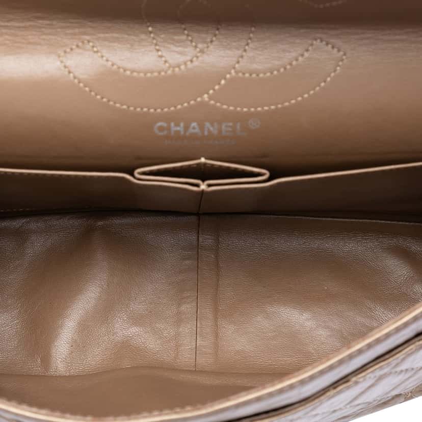 Chanel Quilted Metallic Aged Calfskin Reissue 2.55 Double Flap 226 Brown Leather Very good condition - Model View