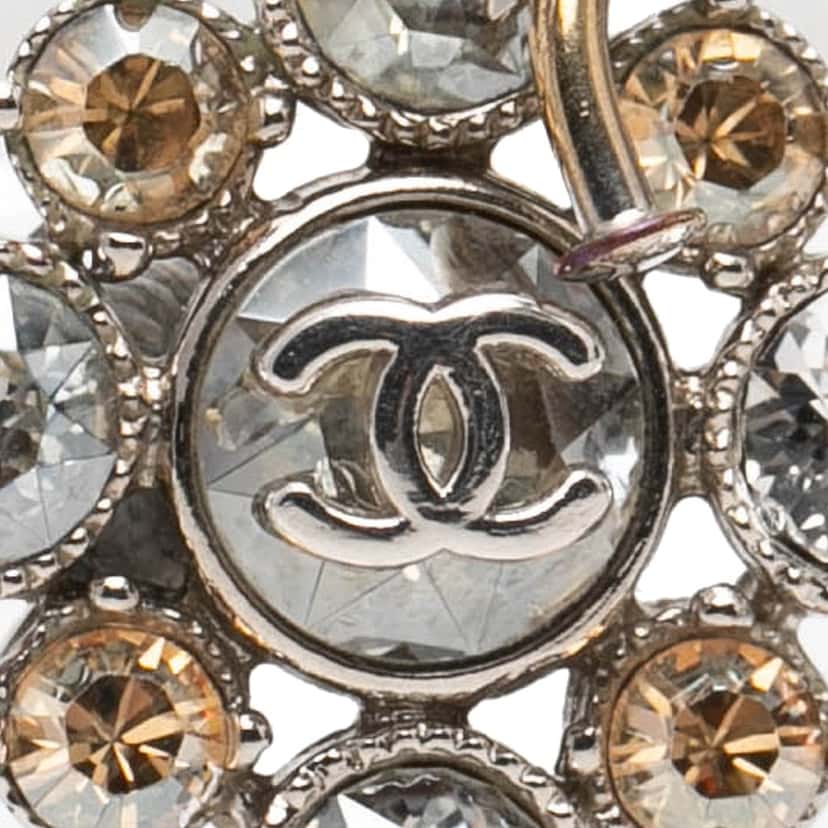 Chanel CC Silver Plated Crystal Rhinestones Dangle Push Back Earrings Silver Metal Very good condition - Model View