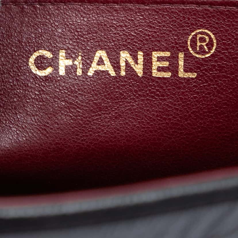 Chanel CC Vertical Quilt Lambskin Flap Black Leather Very good condition - Box View