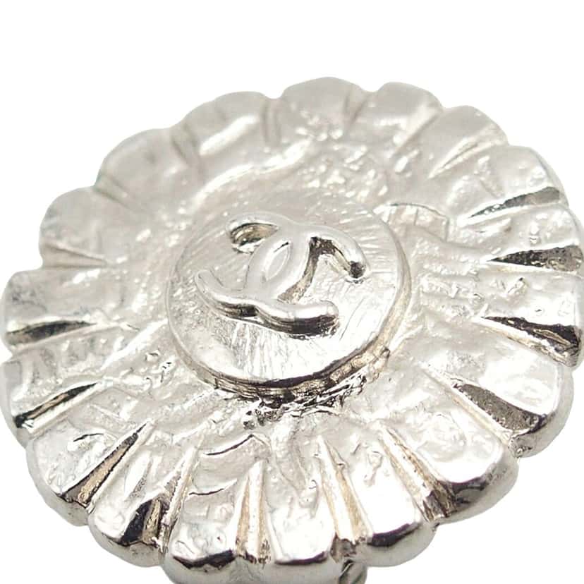 Chanel CC Silver Plated Sunflower Clip on Earrings Silver Metal Very good condition - Model View