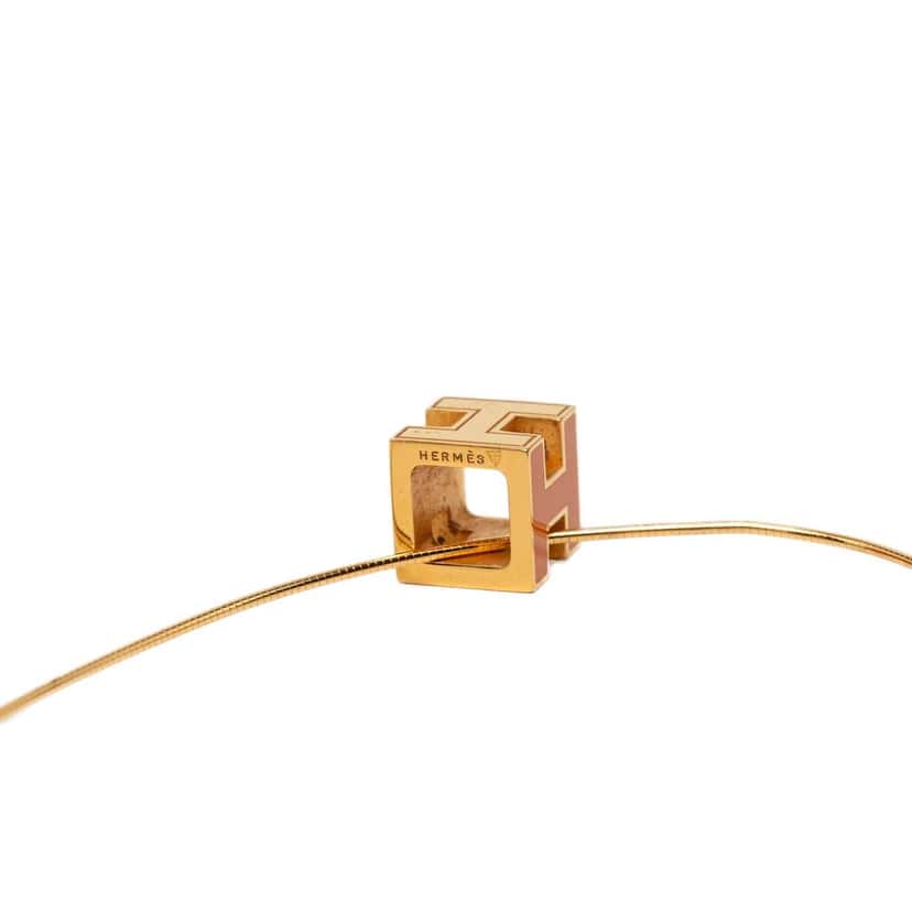 Hermès Gold Plated and Enamel Cage d H Pendant Necklace Gold Metal Very good condition - Model View