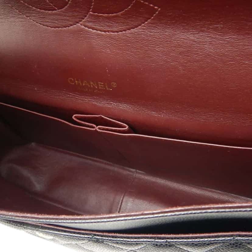 Chanel Maxi Classic Caviar Double Flap Black Leather Very good condition - Model View