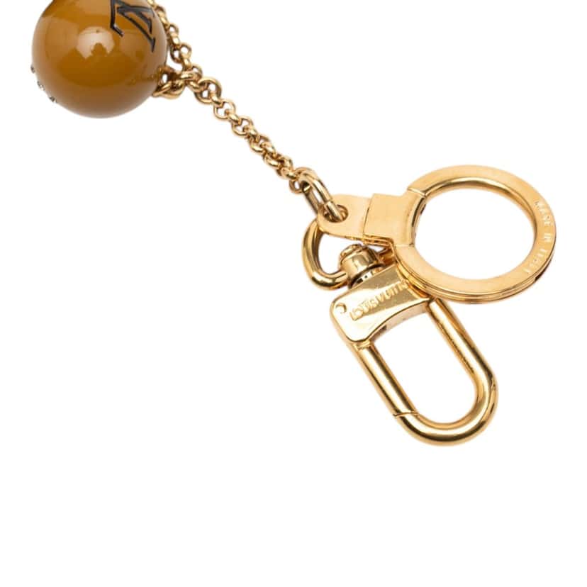 Louis Vuitton Gold Plated Strass and Resin Jack and Lucie Key Holder and Bag Charm Gold Metal Very good condition - Model View