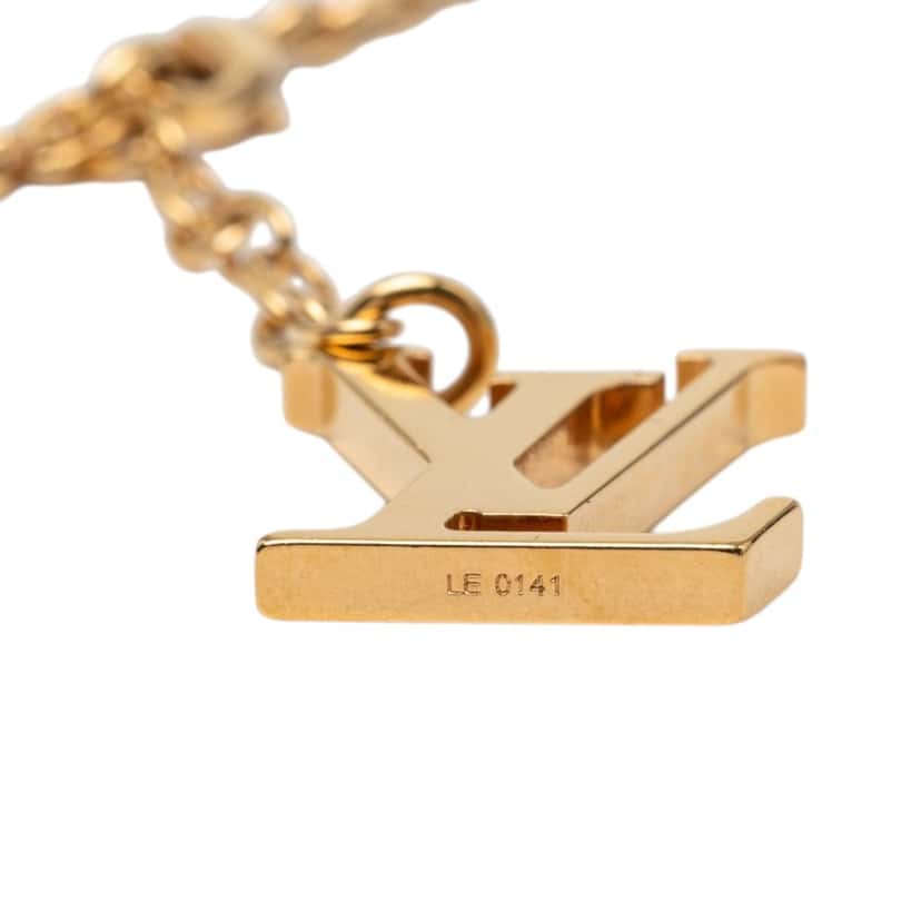 Louis Vuitton Gold Plated Resin Gimme a Clue Pendent Necklace Gold Metal Very good condition - Box View