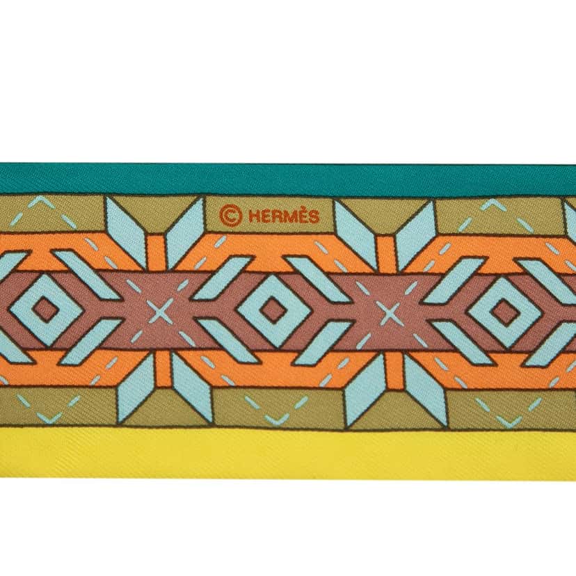 Hermès Belles Du Mexique Silk Twilly Scarf Yellow Never worn - Model View