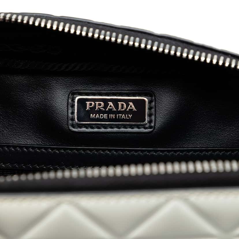 Prada Small Embossed Spazzolato Leather Brique Crossbody White Leather Very good condition - Box View