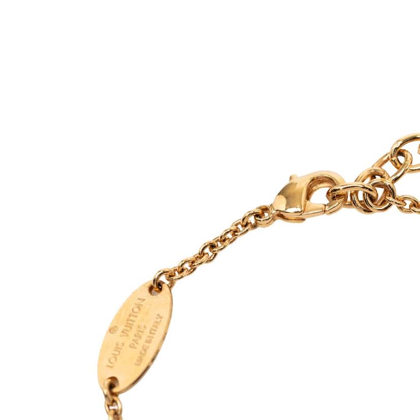 Louis Vuitton Gold Plated LV and Me T Bracelet Gold Metal Very good condition - Model View