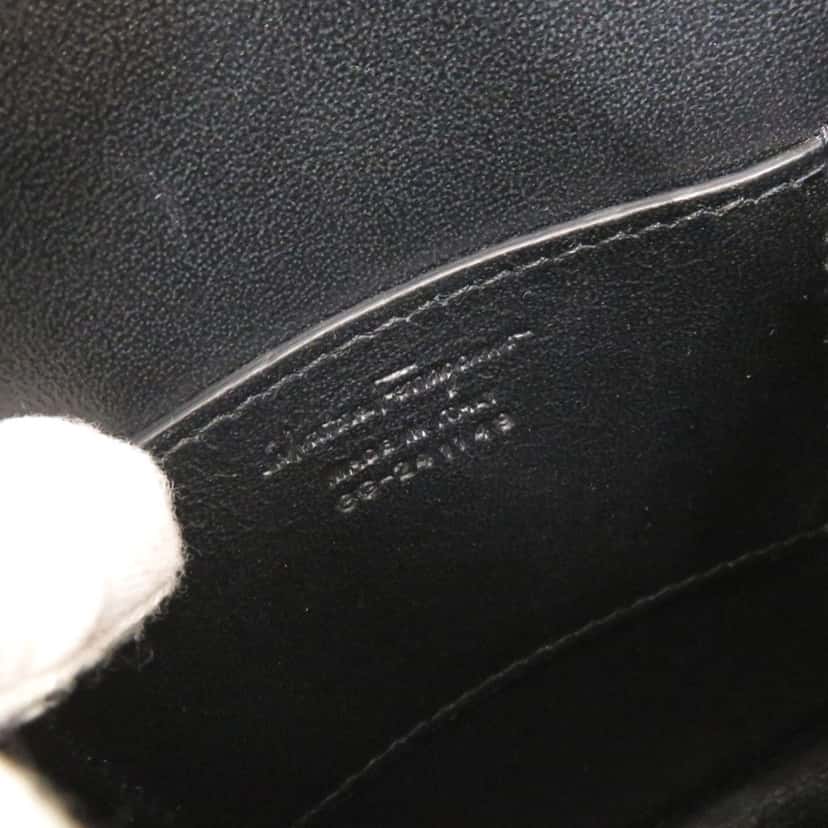 Ferragamo Gancini Embossed Leather Phone Pouch Crossbody Black Leather Very good condition - Model View