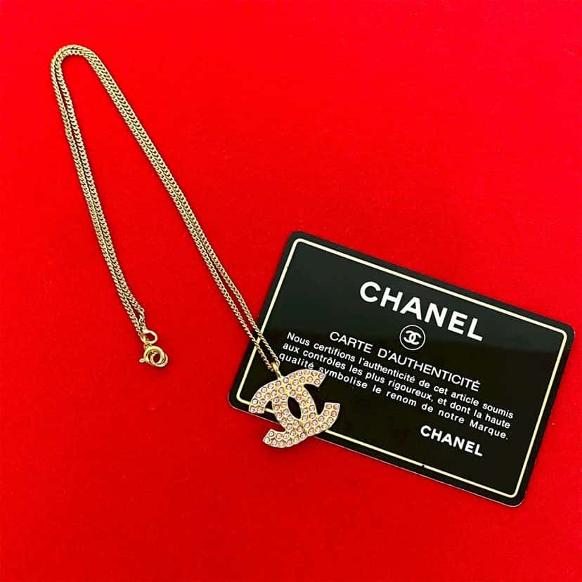 Chanel CC Gold Plated Rhinestone Pendant Necklace Gold Metal Very good condition - Model View