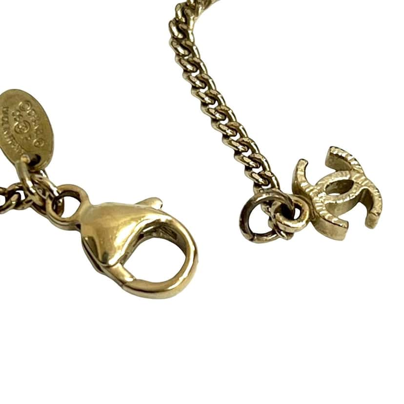 Chanel Gold Plated Resin Crystal CC Pendant Necklace Black Plastic Very good condition - Model View