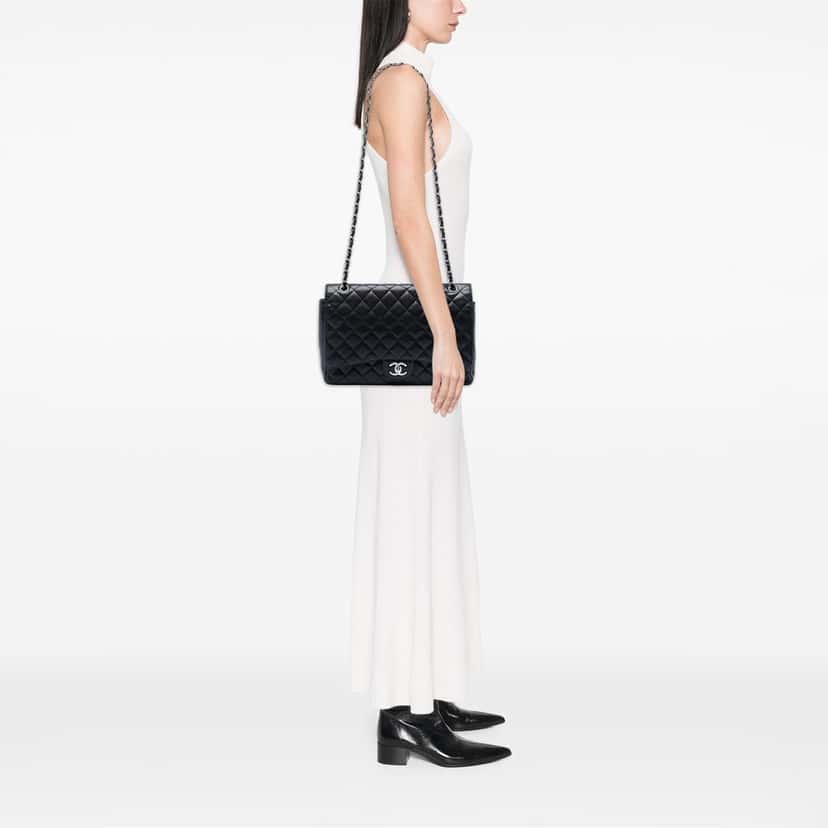Chanel Maxi Classic Caviar Double Flap Black Leather Very good condition - Box View