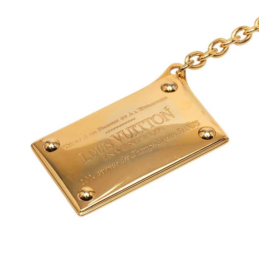Louis Vuitton Gold Plated Inventeur Key Chain and Bag Charm Gold Metal Very good condition - Model View