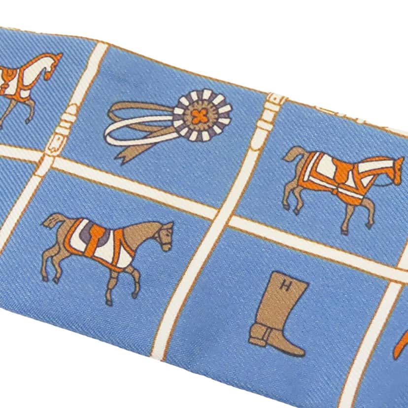 Hermès Couvertures Et Tenues De Jour Twilly Silk Scarf Blue Very good condition - Model View