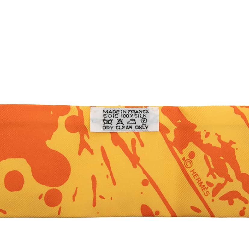 Hermès Paint Splatter Twilly Silk Scarf Orange Very good condition - Model View