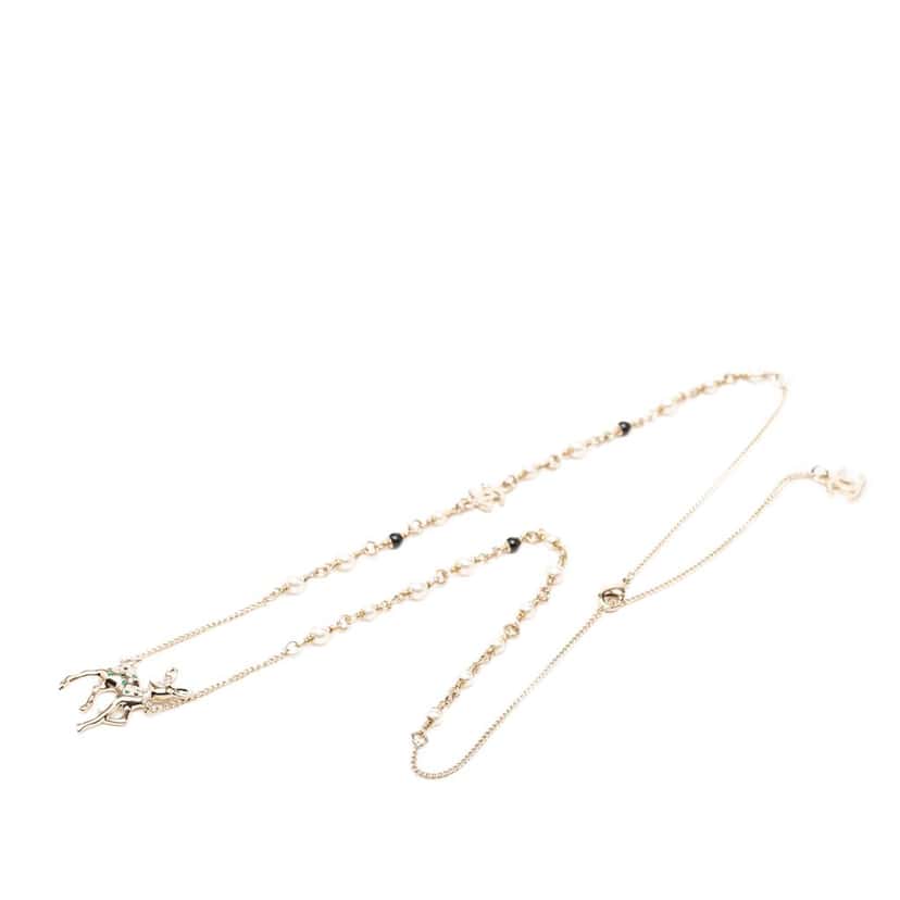 Chanel CC Gold Plated Faux Pearl Strass Deer Pendant Necklace Gold Metal Very good condition - Model View