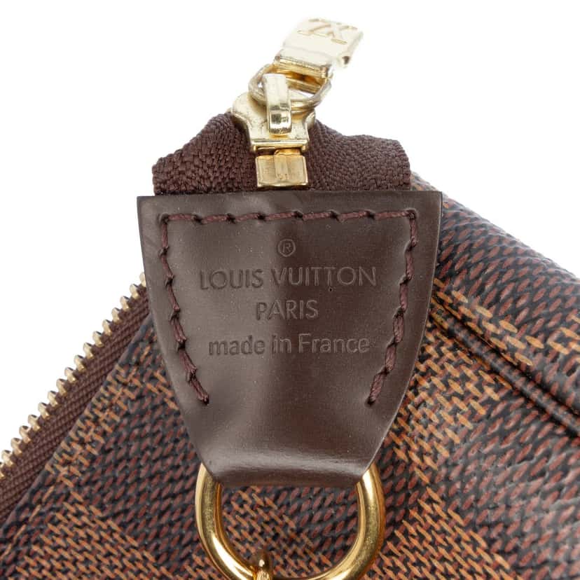 Louis Vuitton Damier Ebene Mini Pochette Accessoires Brown Very good condition - Box View