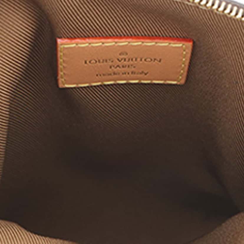 Louis Vuitton Monogram Utility Phone Sleeve Brown Very good condition - Model View