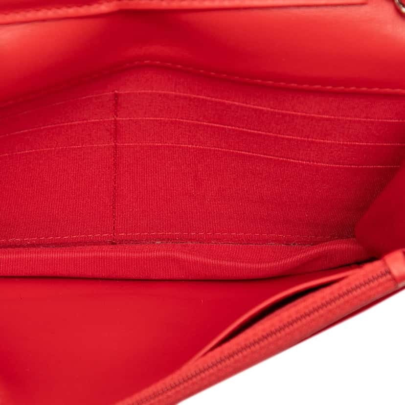 Chanel CC Embossed Lambskin Camellia Wallet On Chain Red Leather Very good condition - Model View