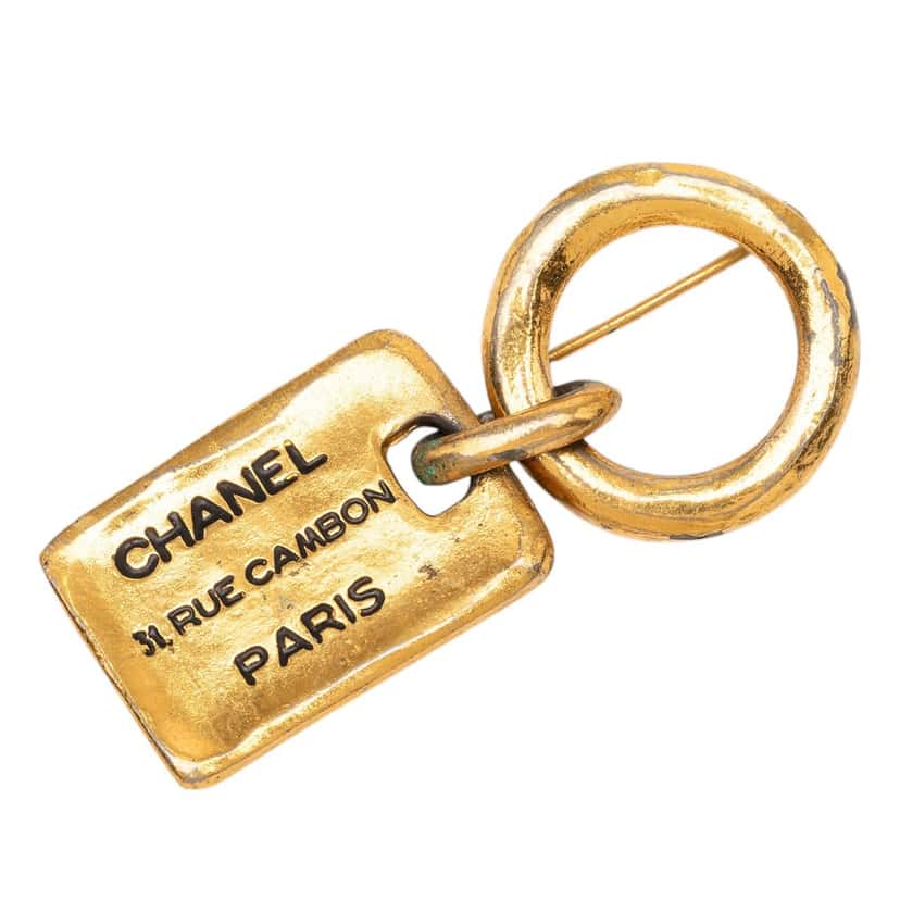 Chanel Gold Plated Rue Cambon Tag Brooch Gold Metal Very good condition - Front View