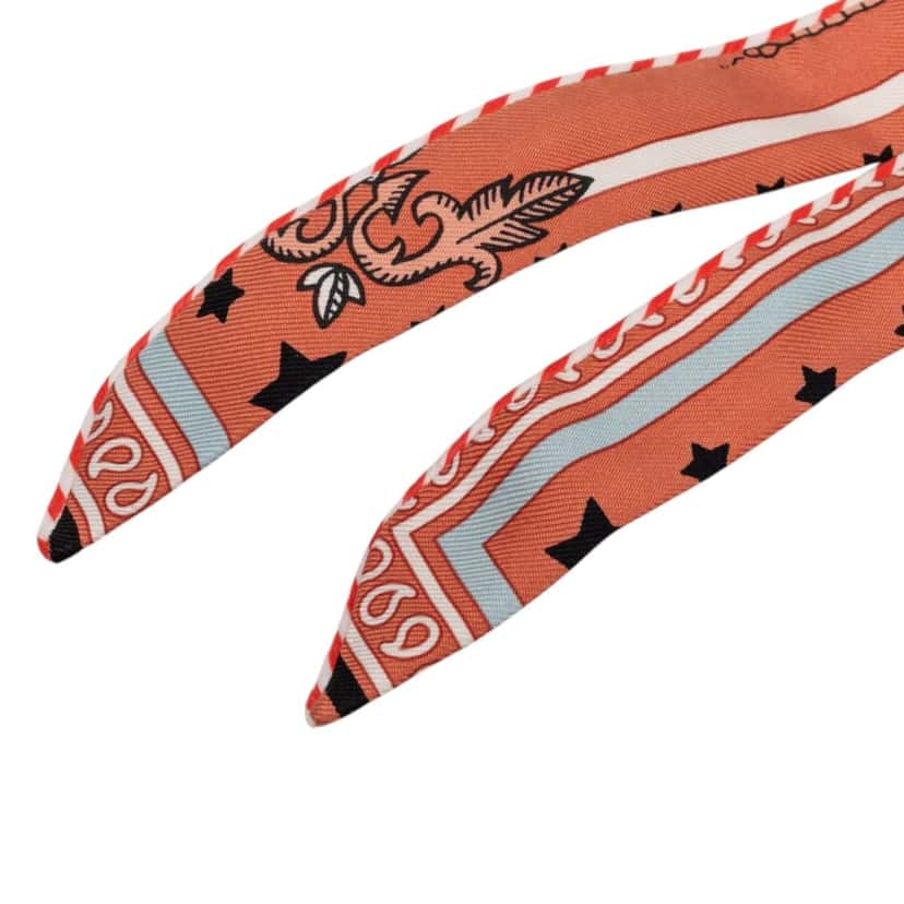 Hermès Candy Doll Silk Twilly Scarf Orange Very good condition - Model View