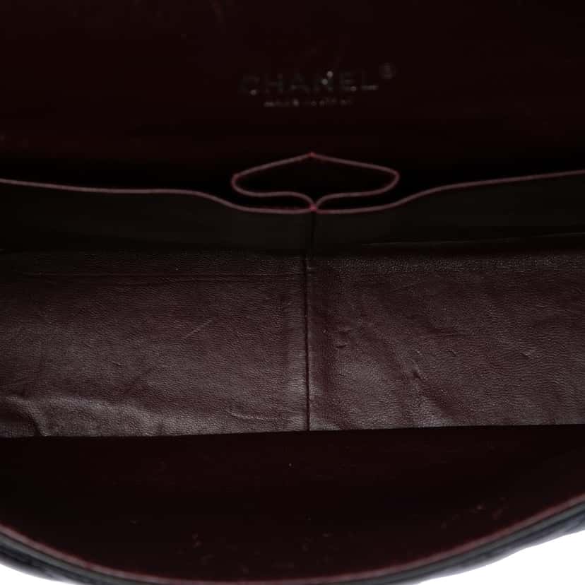 Chanel Maxi Classic Lambskin Double Flap Black Leather Very good condition - Model View
