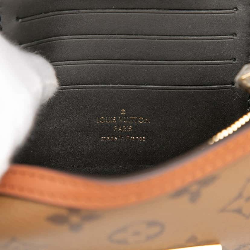 Louis Vuitton Monogram Reverse Dauphine Wallet on Chain Brown Very good condition - Box View