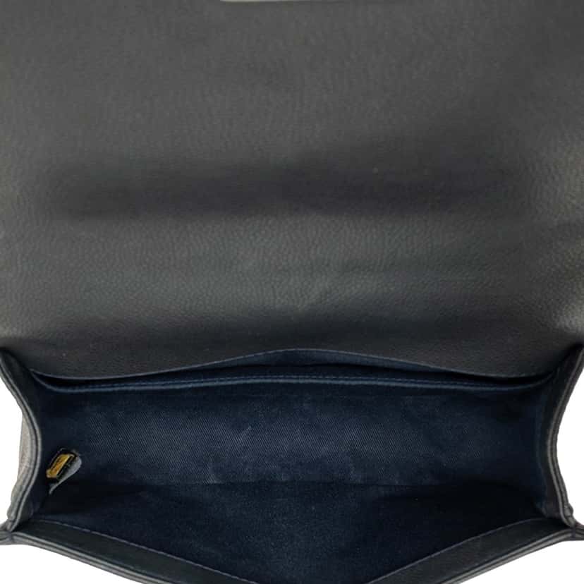 Chanel Medium Caviar Stitched Boy Flap Black Leather Very good condition - Model View