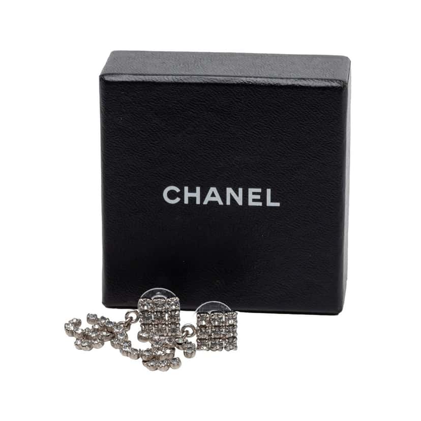 Chanel CC Brass Strass Drop Push Back Earrings Silver Metal Very good condition - Model View