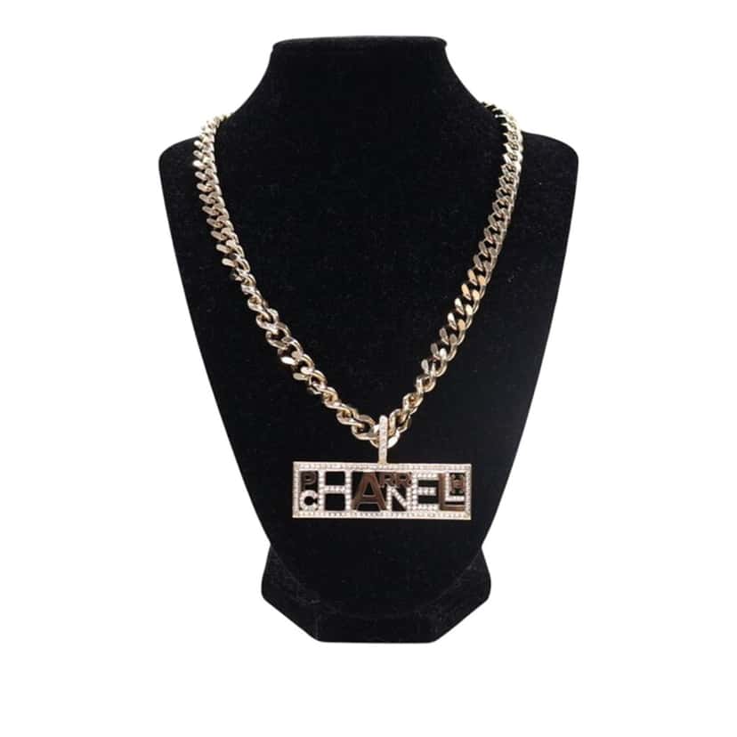 Chanel Pharrell Gold Plated Strass Chain Letters Pendant Necklace Gold Metal Very good condition - Front View