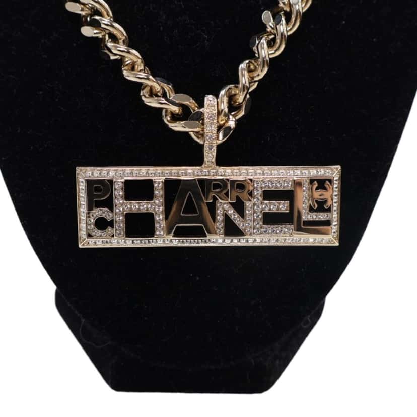 Chanel Pharrell Gold Plated Strass Chain Letters Pendant Necklace Gold Metal Very good condition - Model View