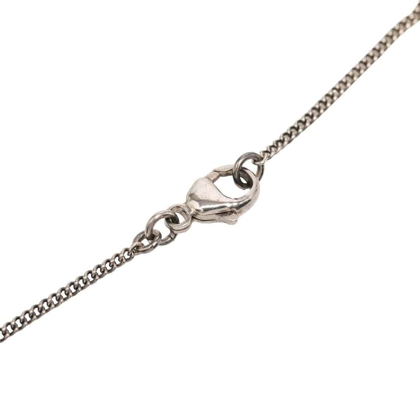 Chanel Brass Faux Pearl and Strass Twisted CC Pendant Necklace Silver Metal Very good condition - Model View