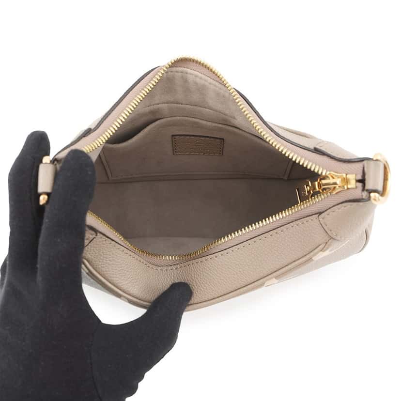 Louis Vuitton Bicolor Monogram Empreinte Bagatelle Brown Leather Very good condition - Model View