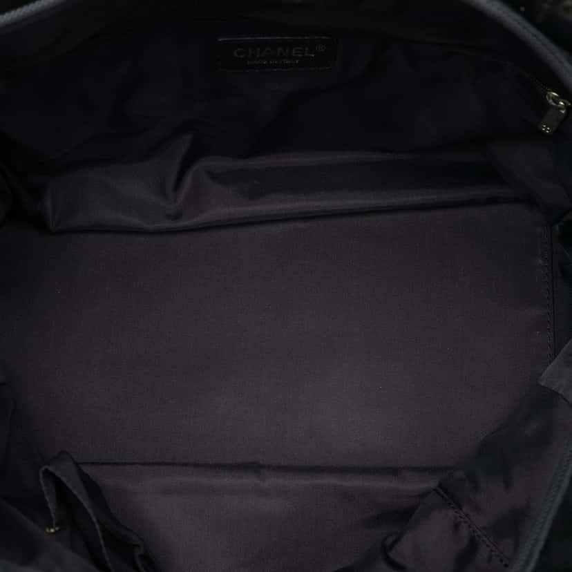 Chanel Medium Quilted Nylon Paris Biarritz Tote Black Very good condition - Model View
