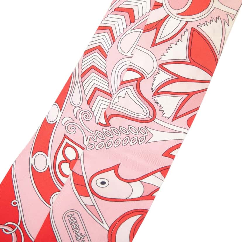 Hermès Folklore Silk Twilly Scarf Red Very good condition - Model View