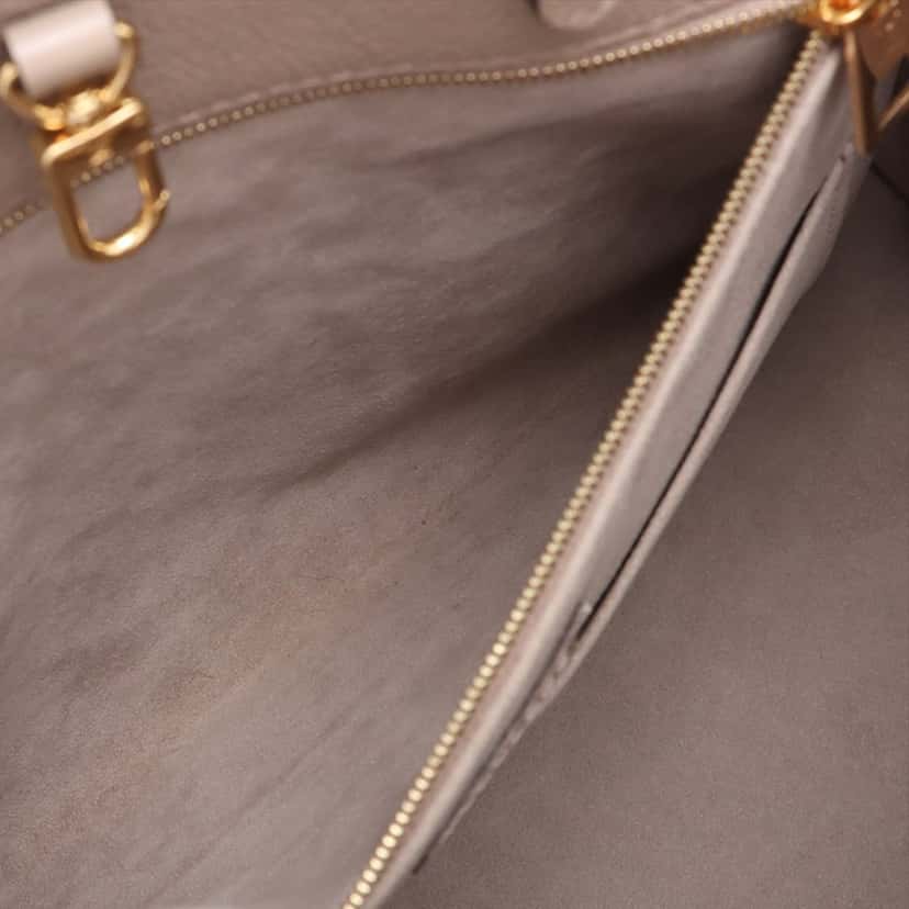 Louis Vuitton Monogram Empreinte OnTheGo MM Beige Leather Very good condition - Model View