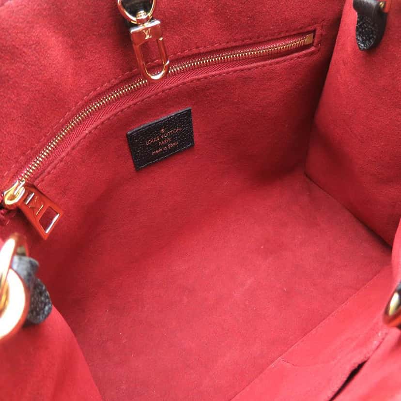 Louis Vuitton Bicolor Monogram Empreinte Giant Onthego PM Black Leather Very good condition - Model View