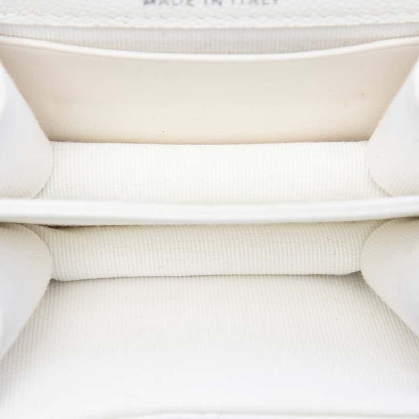 Chanel Mini Quilted Caviar Coco Enamel Strap Flap Clutch with Chain White Leather Very good condition - Model View