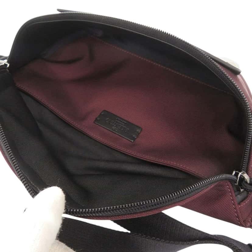 Valentino Nylon and Leather VLTN Rockstud Belt Bag Red Very good condition - Model View
