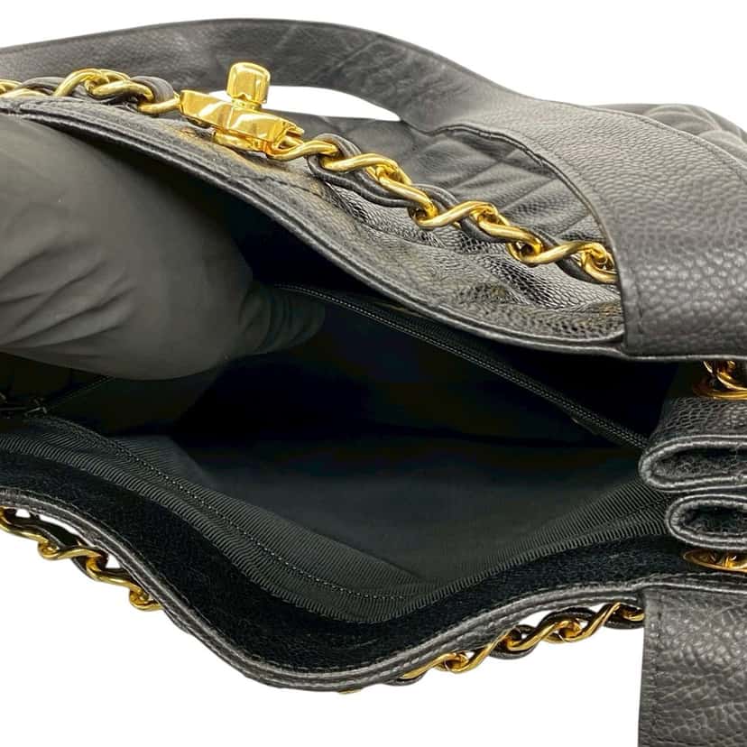 Chanel CC Quilted Caviar Chain Drawstring Tote Black Leather Very good condition - Model View