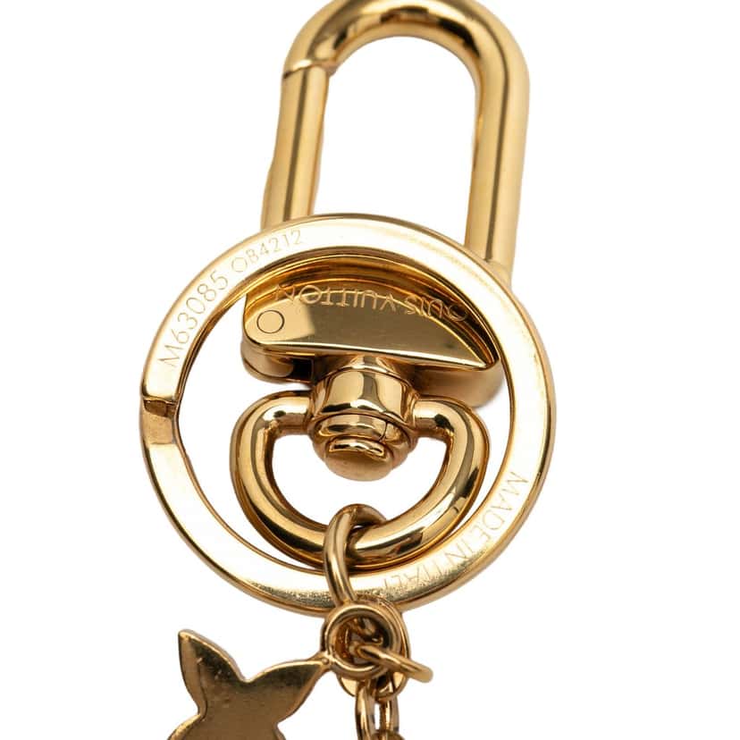 Louis Vuitton Gold Plated Monogram Blooming Flowers Bag Charm and Key Holder Gold Metal Very good condition - Model View